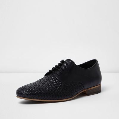 Black woven lace-up shoes